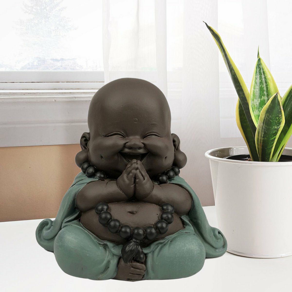 Lachender Buddha Dankend