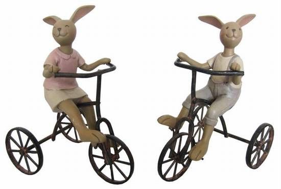 Hase auf Dreirad Hasenjunge auf Dreirad